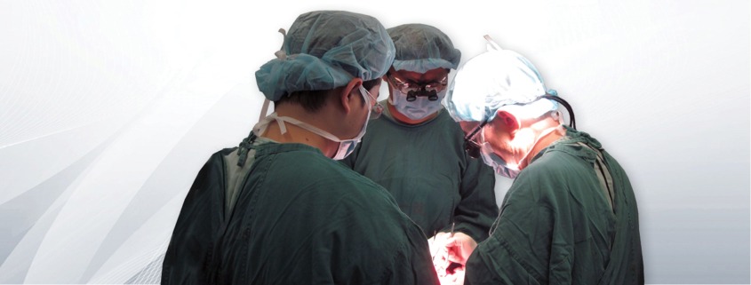 Photo of three medical practitioners wearing SurgiTel loupes